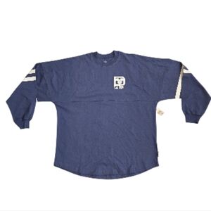 WALT DISNEY WORLD SPIRIT JERSEY IN CLASSIC BLUE. SIZE MEDIUM.